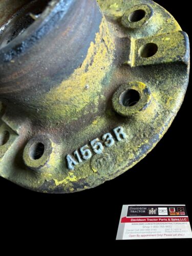USED JOHN DEERE TRACTOR FRONT WHEEL HUB A1553R