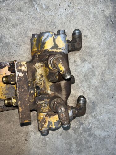 International 444 IH tractor hydraulic control flow valve to powersteering steer