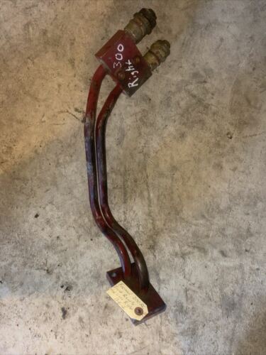Farmall 300 RC IH tractor front right hydraulic oil lines + ex block under tank