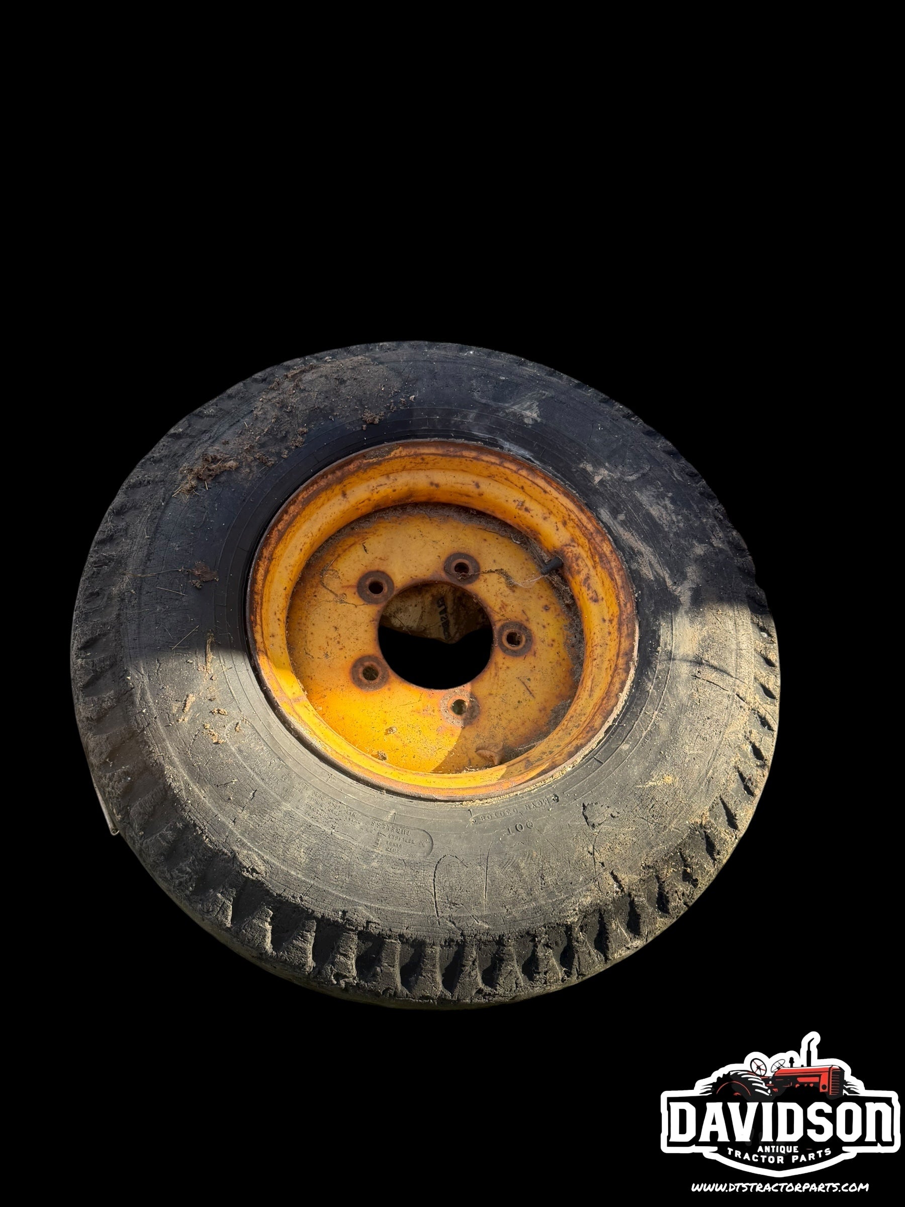 John Deere 500 C backhoe front rim w/tire 14-17.5