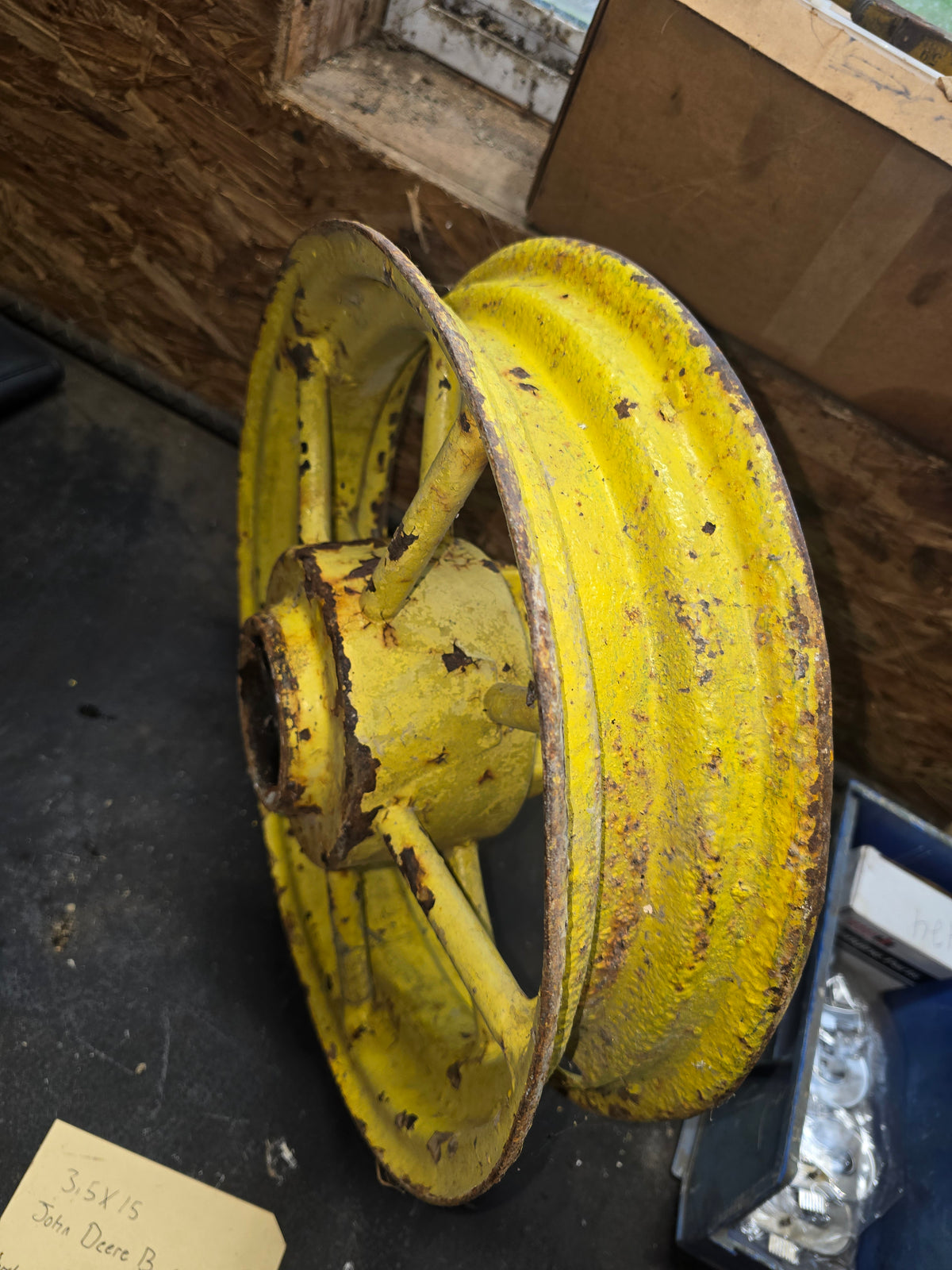 3.5X15 John Deere B roundspoke front wheel rim.